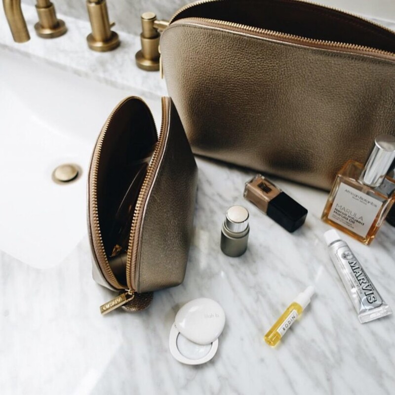 bathroom counter, makeup bag