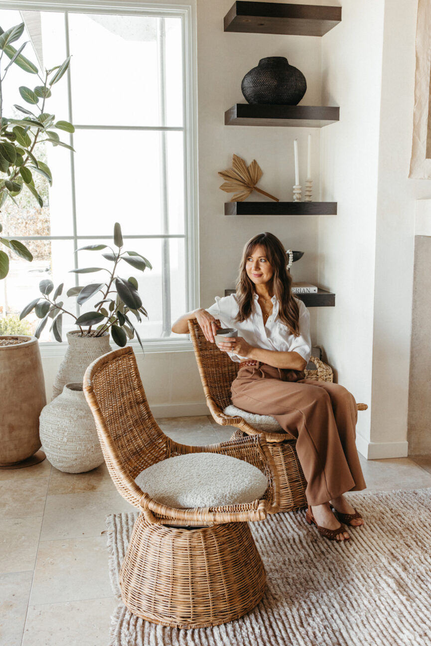 Camille Styles sitting in Woven x Casa Zuma swivel chairs.