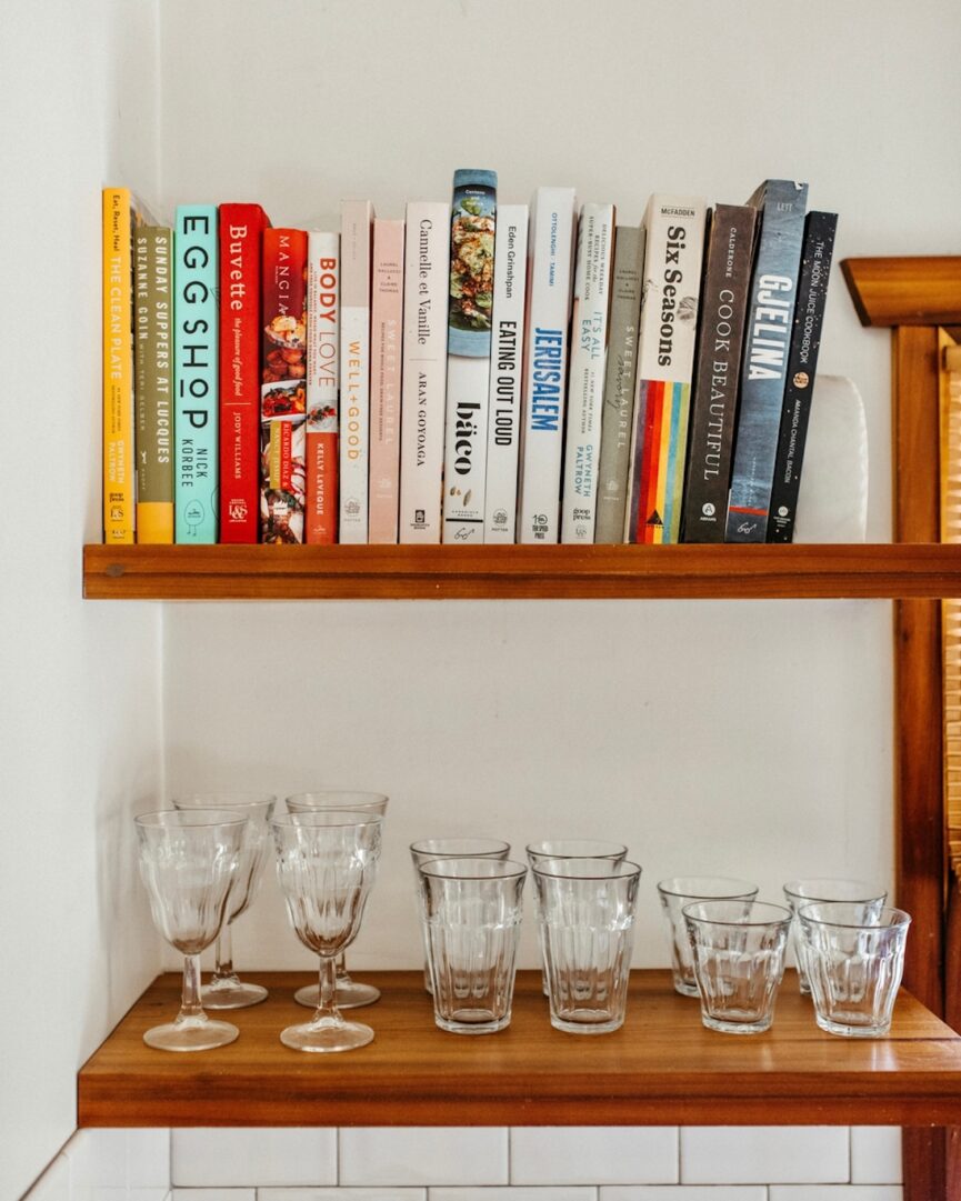 Vintage glasses and cookbooks.