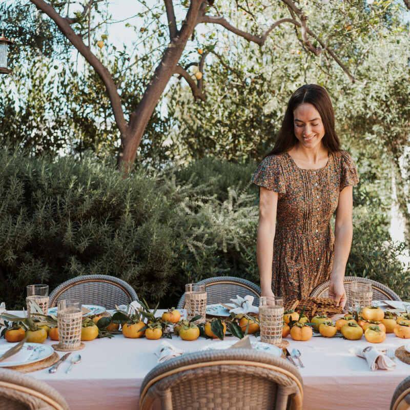 Laurel Gallucci, Sweet Laurel founder, Friendsgiving Brunch at Home in Los Angeles, backyard dinner party table, spring, persimmons