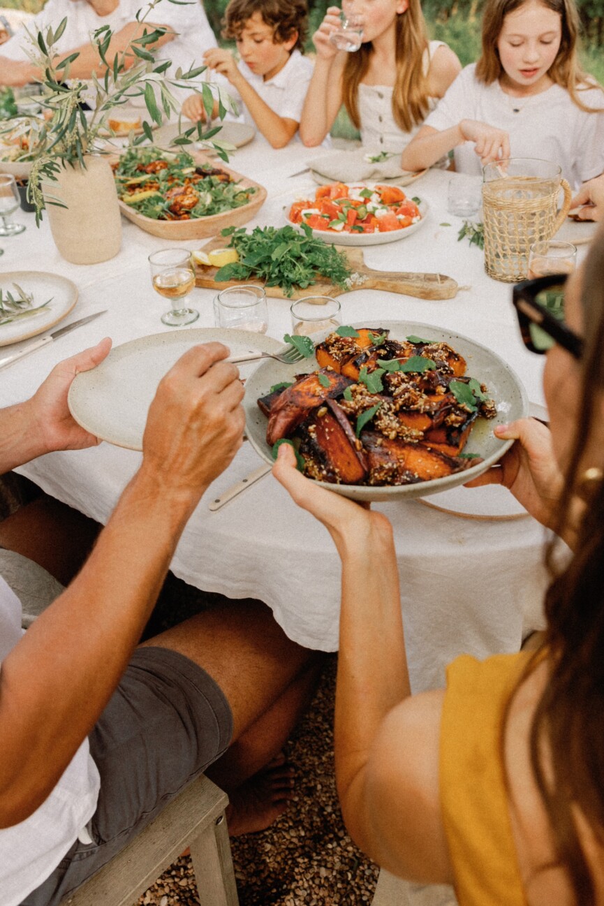 holding sweet potatoes with dates