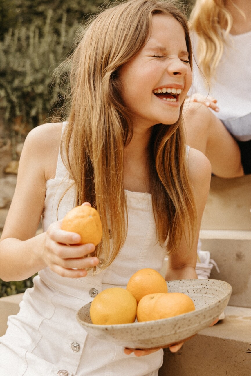 summer entertaining tips-kids laughing citrus