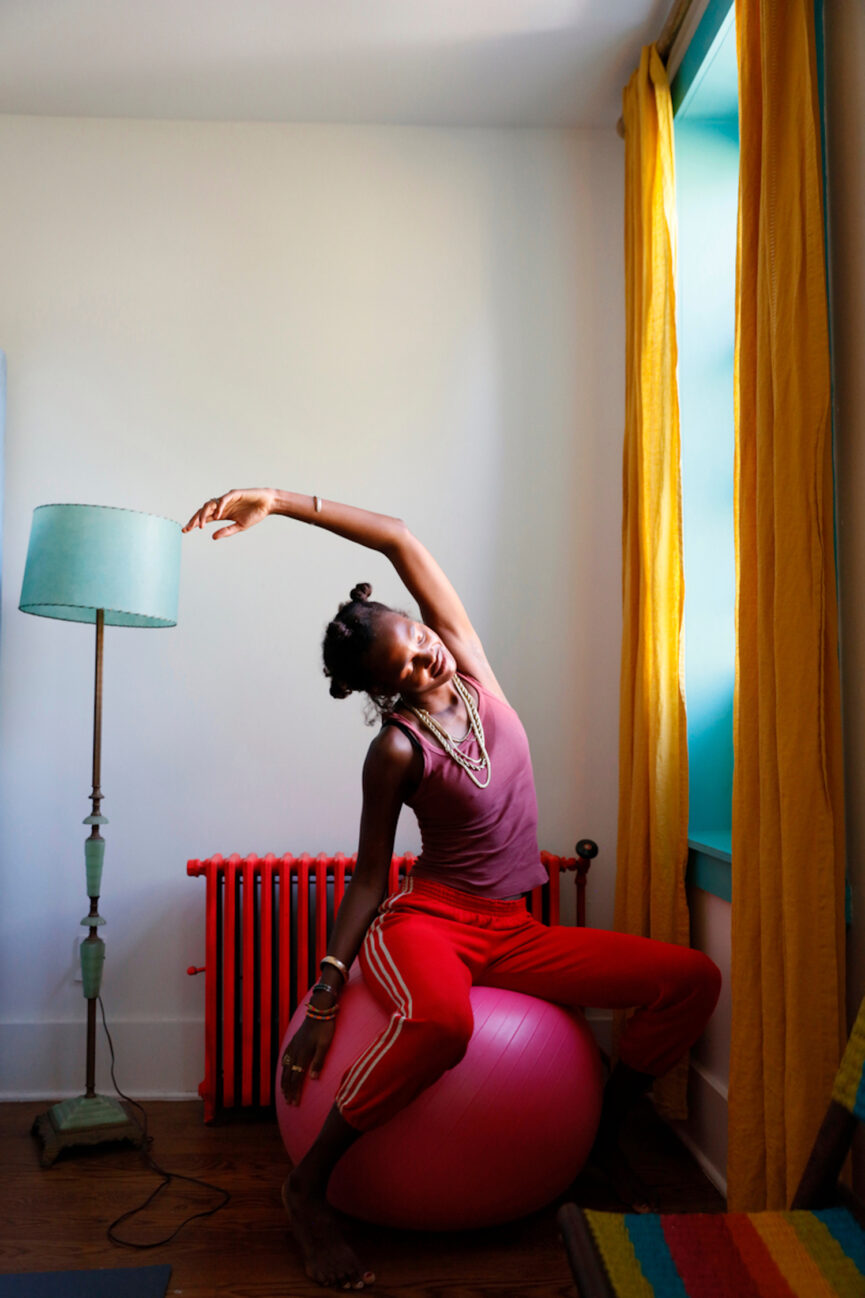 Woman stretching on exercise ball.