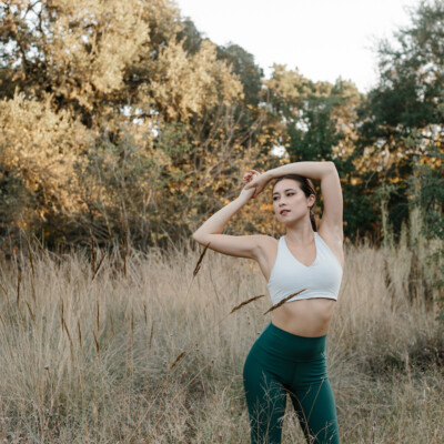 Woman stretching outside best natural deodorants.